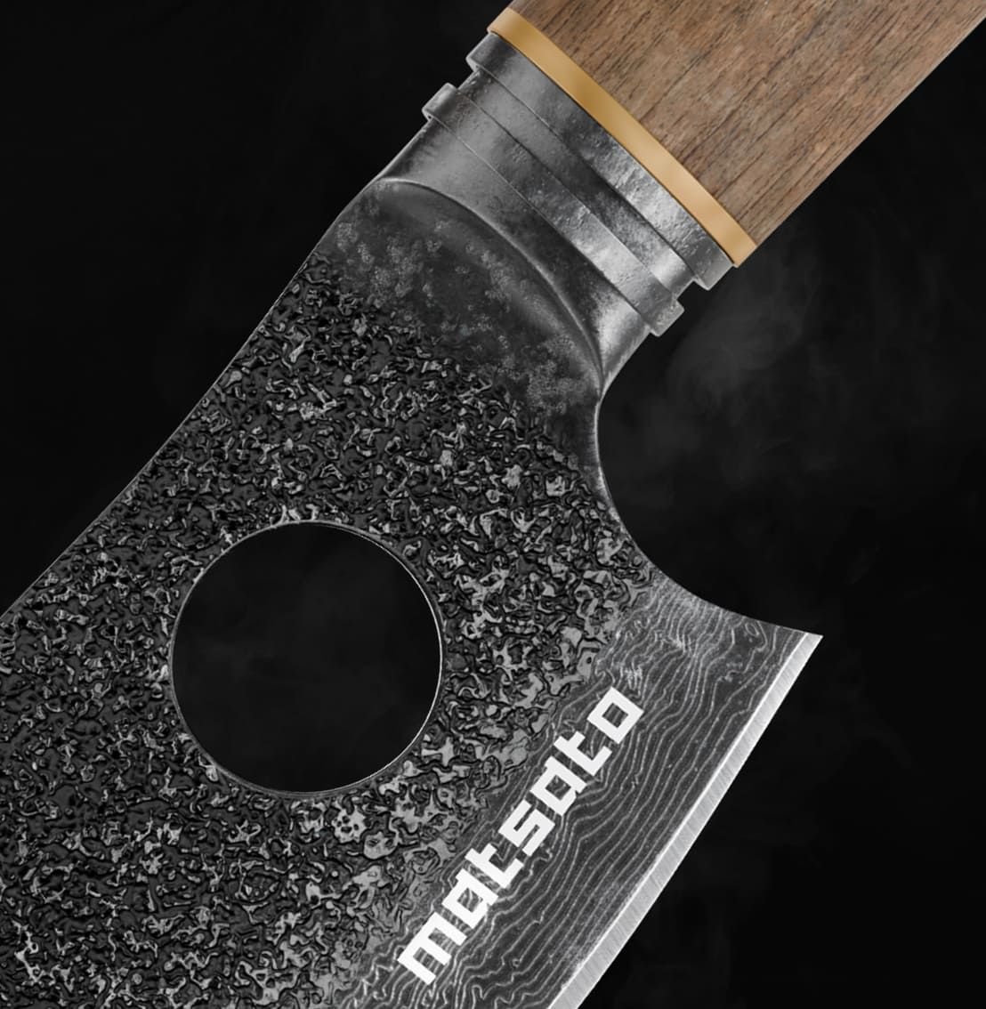 Close-up of the Matsato knife blade, index-finger hole and acacia wood handle